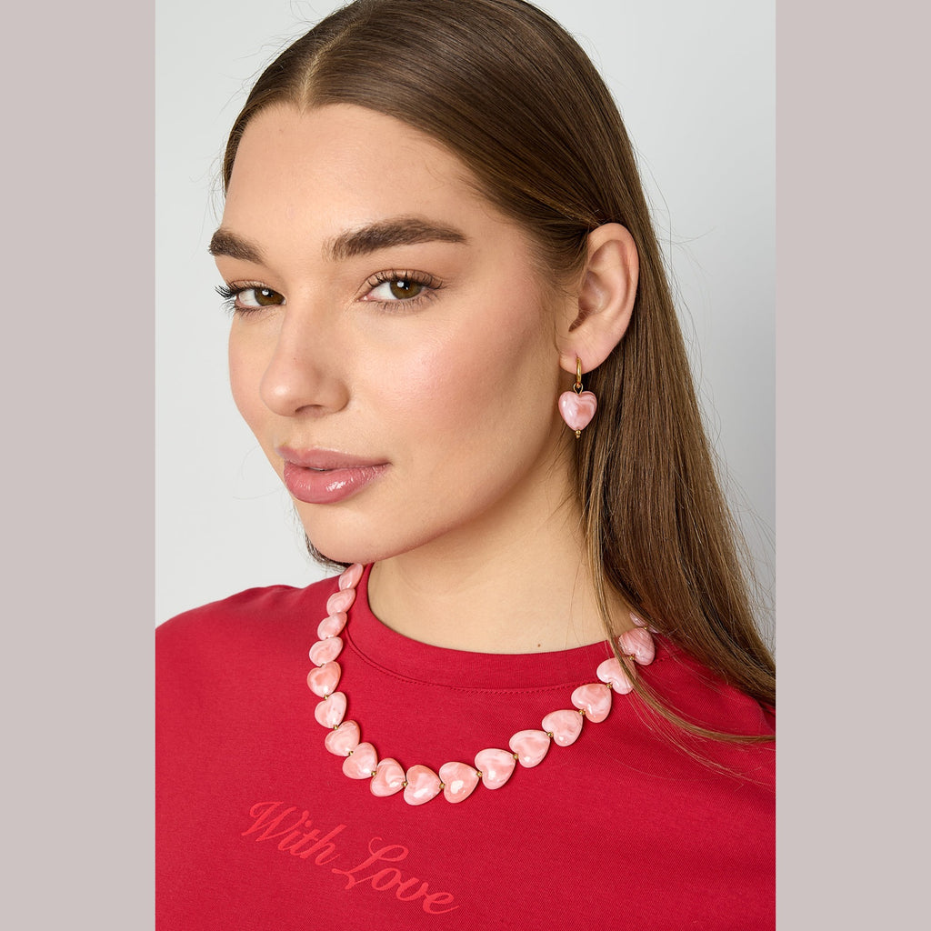 Earrings with heart-shaped beads