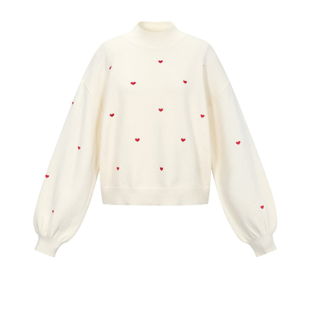 Gebreide trui met hartjes