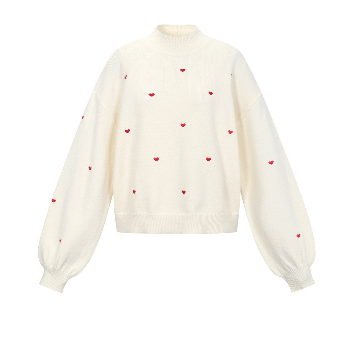 Gebreide trui met hartjes