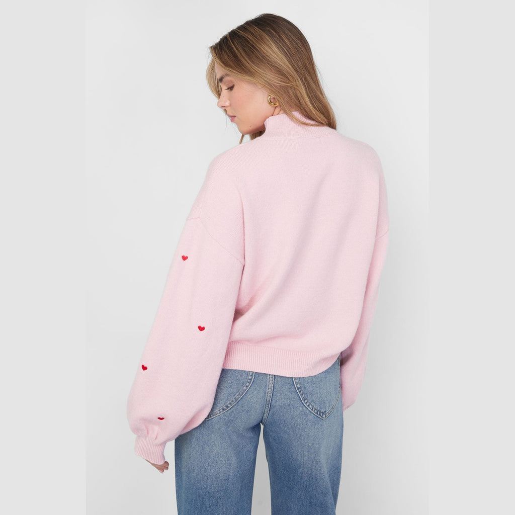 Gebreide trui met hartjes