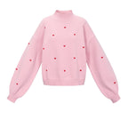 Gebreide trui met hartjes